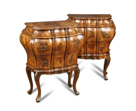 A pair of Italian walnut commode chests, Venetian, mid 18th century, each of serpentine bombe outline, crossbanded and line i
