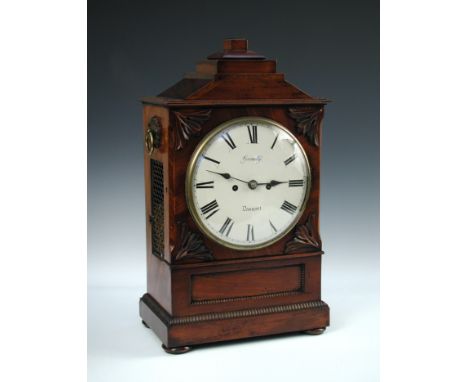 A late Regency mahogany bracket clock, the raised top case with painted circular dial marked 'Gormully Devonport', ring handl