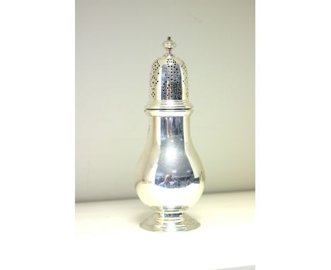 A silver sugar caster, by the Barnards, London 1937, of plain baluster form, the drill pierced cover with flattened ball fini