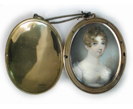 English School (19th Century)   A Regency portrait miniature of a young lady wearing a white dress watercolour on card, in a 