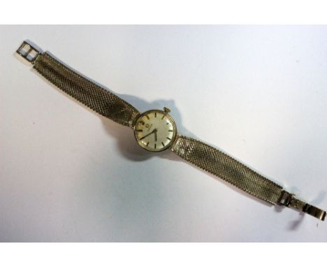 Omega - a lady's 9ct gold cased wristwatch, with silvered dial applied with gold coloured baton numerals, the manual movement