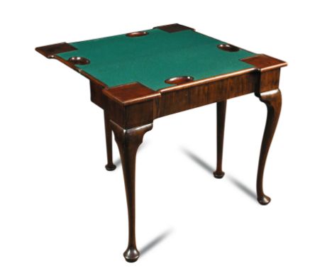 A George II mahogany card table, mid 18th century with outset corners, green baize lining and counter recesses, end drawer, o