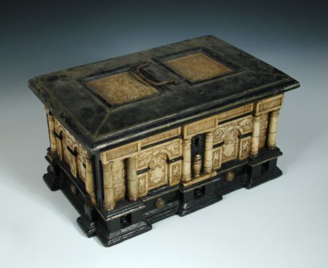 An ebonised and alabaster inset casket, possibly 17th century Spanish, the hinged cover with inset panels above a colonnaded 
