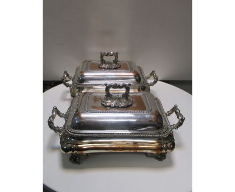 A pair of Old Sheffield Plate entree dishes on warming bases, by H D Wilkinson & Co, Sheffield, , the covers with detachable 