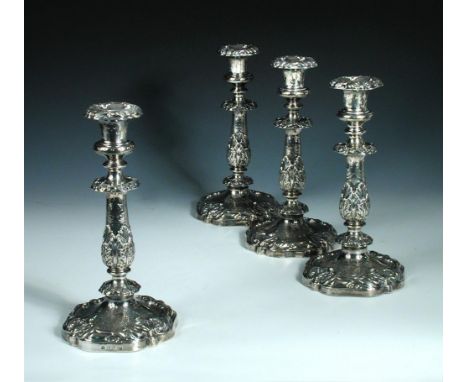 A set of four Victorian silver candlesticks, by Padley, Parkin & Co (x3) and Henry Wilkinson & Co (x1), Sheffield 1841, each 