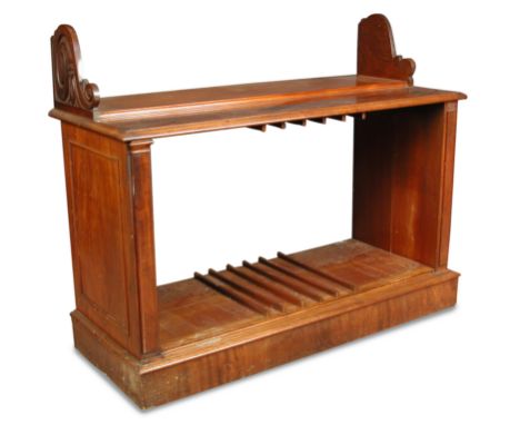 A William IV mahogany rectangular folio stand by A & J Ashfords, Saxmundham, with carved end brackets forming a shelf above a