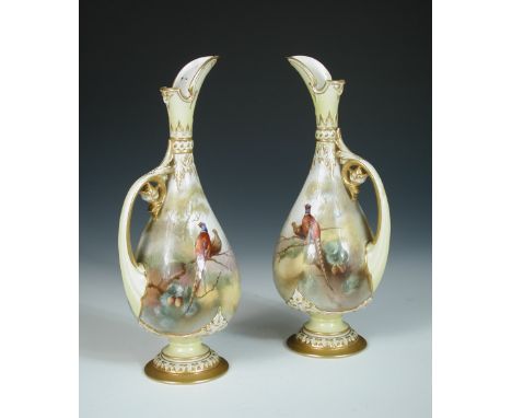 A pair of Royal Worcester 'Hadley Ware' ewers, painted by William Powell, with pheasants perched on branches, within gilt and