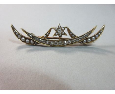 A diamond and seed pearl triple crescent and star brooch, the central open crescent set with a graduated line of old round, o