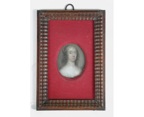 Circle of Cornelius Johnson (1593-1661) Portrait miniature of a lady, said to be Queen Henrietta Maria wearing a lace trimmed