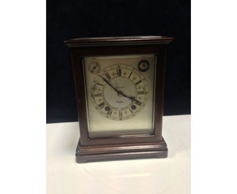 A 1920s mahogany bracket clock, the bevelled glazed rectangular case with silvered dial marked 'Horner Halifax', with Roman n