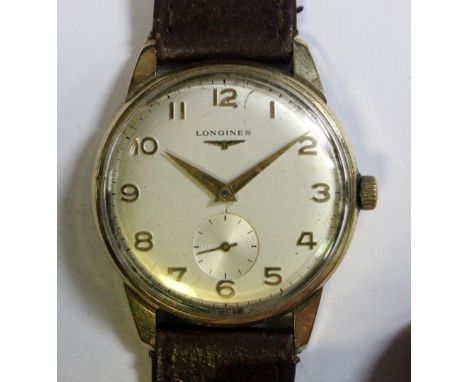 Longines - a gentleman's 9ct gold cased wristwatch, the silvered dial with applied gold coloured Arabic numerals, centresweep
