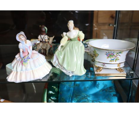 Two Royal Doulton bone china figures “Daydreams” (HN 1731); &amp; “Fair Lady” (HN 2193); together with two Goebel Hummel figu