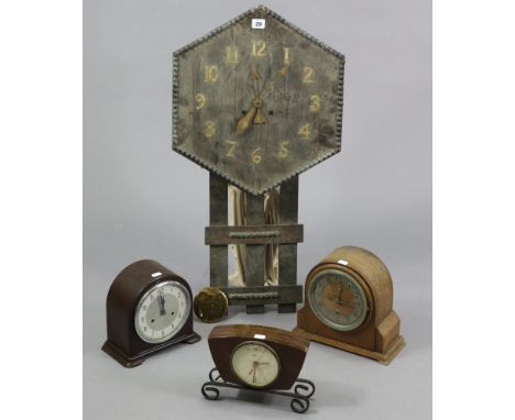 A mid-20th century oak-cased wall clock, 32” high; together with three mantel clocks. 