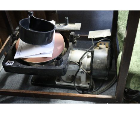A Draper 230V bench grinder; a Titan angle grinder; &amp; various other tools.