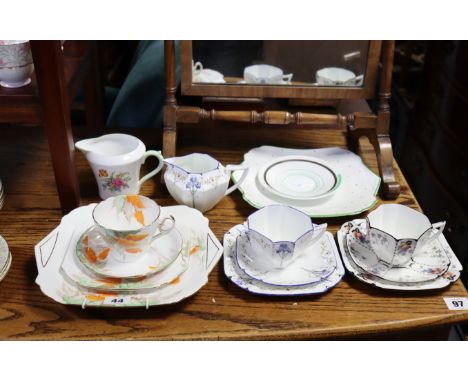 Fourteen various items of Shelley bone china teaware; &amp; a Royal Doulton bone china floral decorated twenty piece part tea