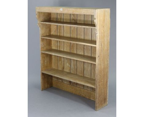 A light oak four-tier standing open bookcase, 42½” wide x 52” high. 