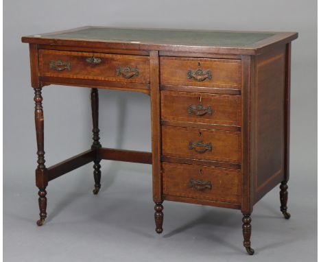A late Victorian inlaid-mahogany knee-hole desk inset gilt-tooled green leather, fitted four long drawers to the right-hand s