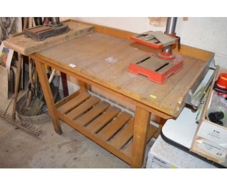 A wooden greenhouse bench 