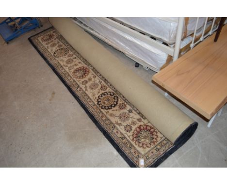 A blue patterned carpet, 9'10" x 7'9" approx.