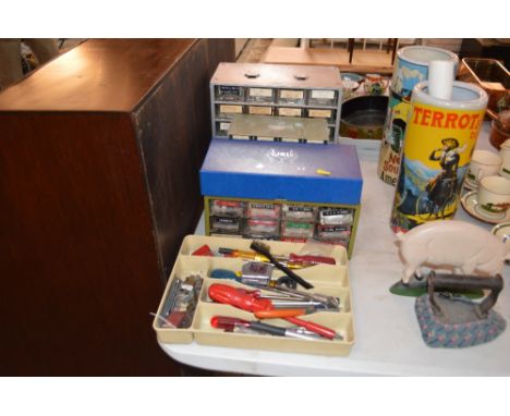 Three small cabinets and contents of various screws, plugs, washers, and accessories; and a tray of various small hand tools 