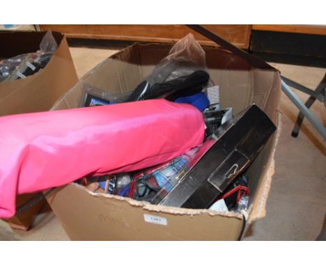 A box of various sports equipment to include a Dunlop auto putt trainer; beach volley ball net; various other items etc. 