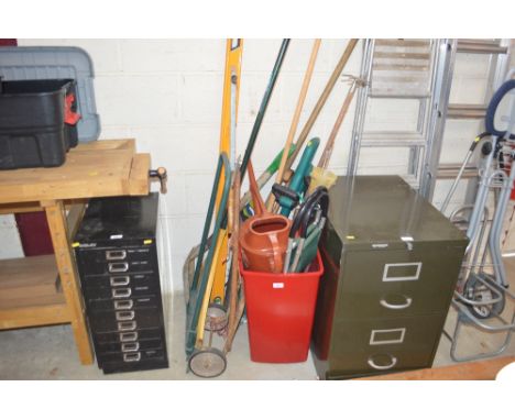 A quantity of gardening tools including watering can, shovels etc. 