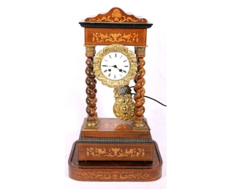 Late 19th century French marquetry rosewood portico clock, with enamel Roman dial, and cylinder movement, on a rectangular ro