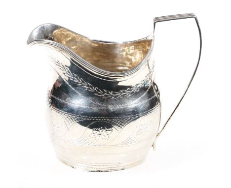 George III silver helmet shaped cream jug with brightcut engraving, London 1801, 90g, 9.5cm.