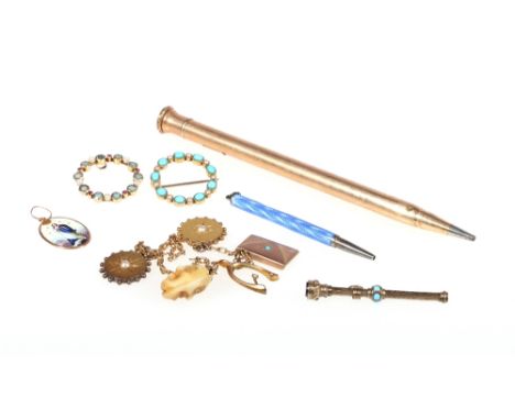 15ct gold aquamarine and seed pearl circular brooch, another similar and an enamelled pendant, three pencils and a charm brac