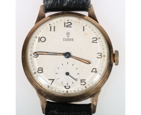1940's Gents Tudor wristwatch, with Arabic silvered dial, in yellow metal case. CONDITION REPORT: No logo on the crown
Winds 