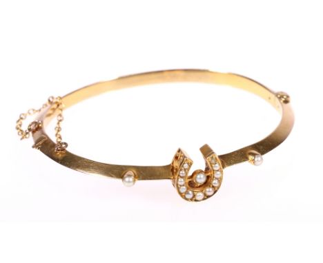 15ct gold seed pearl horseshoe bangle 8.5g CONDITION REPORT: No obvious significant dents.  Clasp needs pushed slightly to li