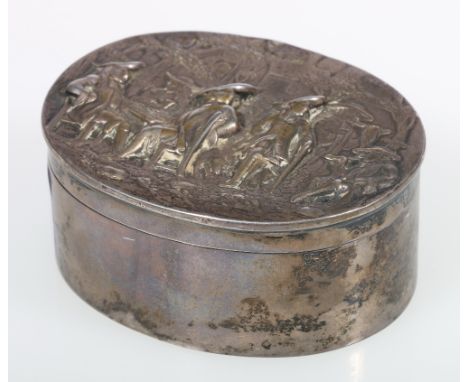 Victorian Scottish silver snuff box of oval form, the cover embossed with a smoking scene, maker J C, 147g, 8cm long