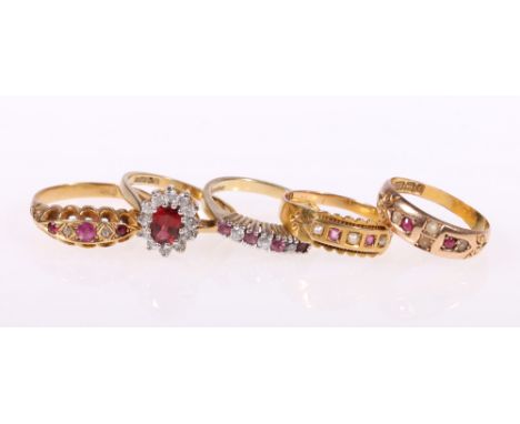 18ct gold ruby and diamond five stone ring, 4.8g, 15ct gold and ruby pearl ring, 2.7g, 15ct gold ruby and pearl ring 2.3g and