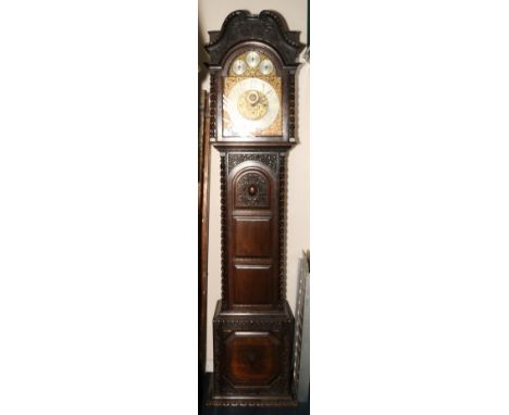 Winterhalder and Hoffmeier carved oak longcase clock, the arched dial with silvered Arabic chapter, seconds, strike / silent,