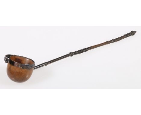 Victorian cocquilla nut and whale bone white metal mounted toddy ladle, 29cm.
