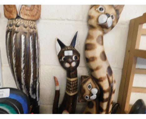 TWO EASTERN SOFT WOOD PAINTED MODELS OF CATS TOGETHER WITH A FURTHER PAINTED MODEL OF AN OWL (3)   