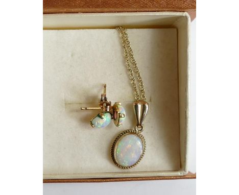 9ct gold opal pendant and necklace and matching earrings. (4) 