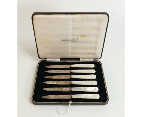 Set of six cased sterling silver cake or fruit knives with Mother of Pearl handles.  High quality items in pristine, hardly i