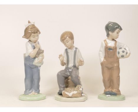 Nao figurines to include girl with doll, boy with football and boy with puppy (3) 