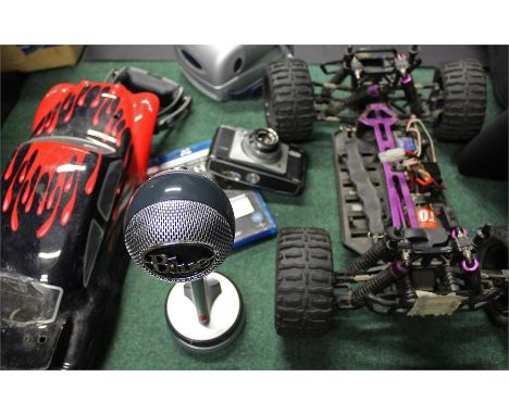 Mixed lot to include remote control cars, headphones and a polaroid camera (qty)
