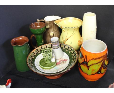 Poole pottery vase, together with two plates, a Sylvac holder, a squirrel jug Burleigh ware, vases, etc, (qty)