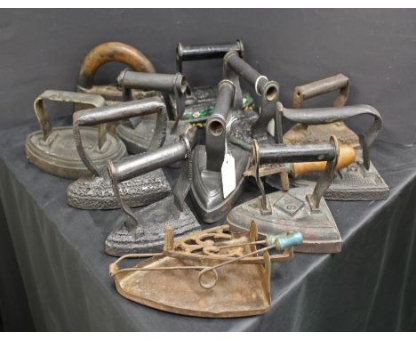 collection of flat irons makers including Silvesters, R. Woodyatt Co.