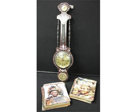 Electronic barometer together with a collection of Family of Man magazine (qty)