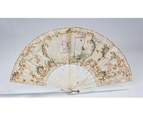 18th Century silk hand painted fan, the central panel decorated with three figures in a garden, with birds flowers and some m