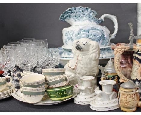 Washbasin set, with a jug, bowl and basin, a jug, a Staffordshire spaniel, steins, coffee cups, two candlesticks and a set of