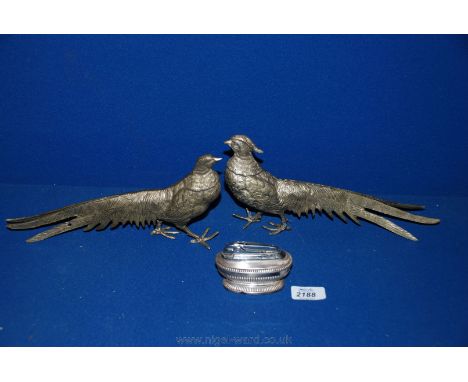 A pair of white metal Pheasants and a Ronson Table Lighter