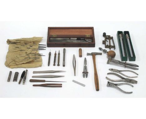 A Large Quantity of Early XIX Century watchmakers/ Repairers' Tools including two boxed brushes, a hammer, hand tools, a smal