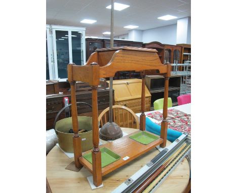 XX Century Oak Umbrella/ Stick Stand with a single drawer on turned and block supports, two drip trays, 60cm