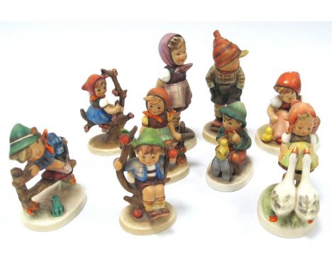 Nine c.1960's Hummel Figures, to include 'Which Hand? No 258, 'March Wind' No 43, Goose Girl, Chick Girl all with small bee m