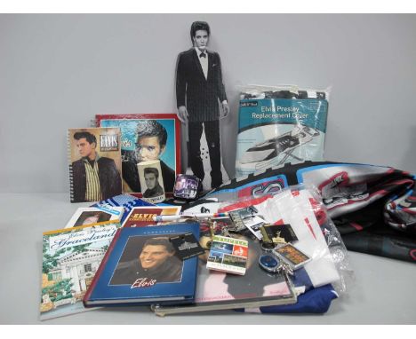 Elvis Interest - A quantity of novelty Elvis memorabilia to include keychains, pin badges, Cardboard cutouts with electric ta